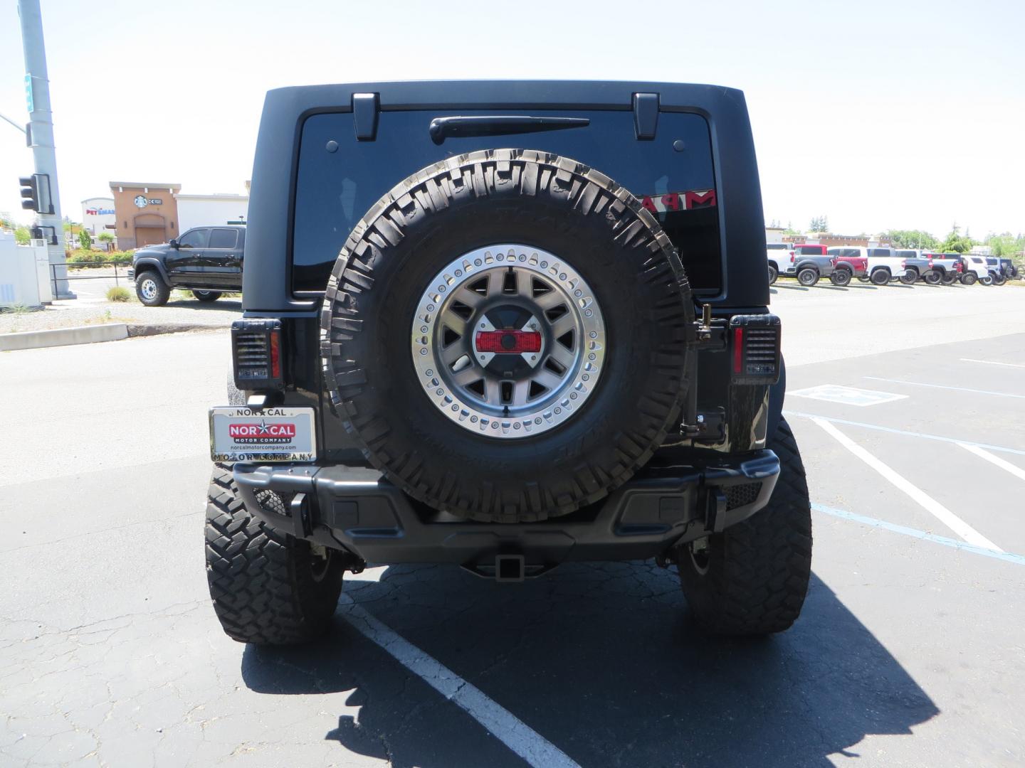 2017 BLACK /BLACK Jeep Wrangler Unlimited Rubicon 4WD (1C4BJWFG5HL) with an 392 Hemi Swapped engine, located at 2630 Grass Valley Highway, Auburn, CA, 95603, (530) 508-5100, 38.937893, -121.095482 - !!!!!!!!!!! NOT FOR SALE IN CA !!!!!!!!!!!!!! 392 Hemi swapped JK with a ton of extras...... Teraflex Long arm suspension system, Fox 2.0 remote reservoir shocks, Fox ATS steering stabilizer, Teraflex bump stops, Limit straps, Adams front and rear drivelines, Teraflex exhuast spacer, Dakota Custo - Photo#5